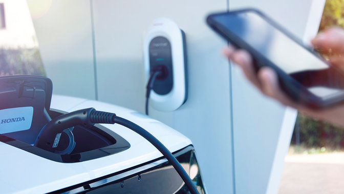 Modèle utilisant l'application My Honda+ qui envoie des mises à jour sur l'état de charge.