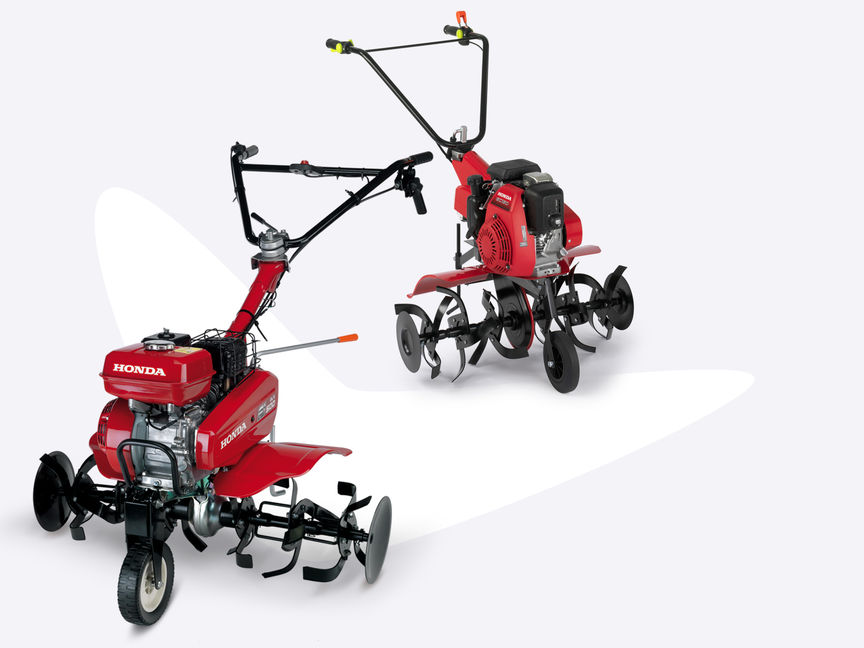 Deux motobineuses compactes Honda.