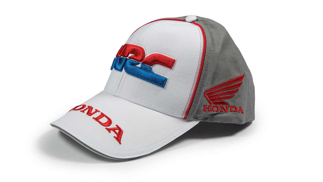 Casquette aux couleurs de l’équipe Honda HRC, avec logo Honda Racing Corporation.