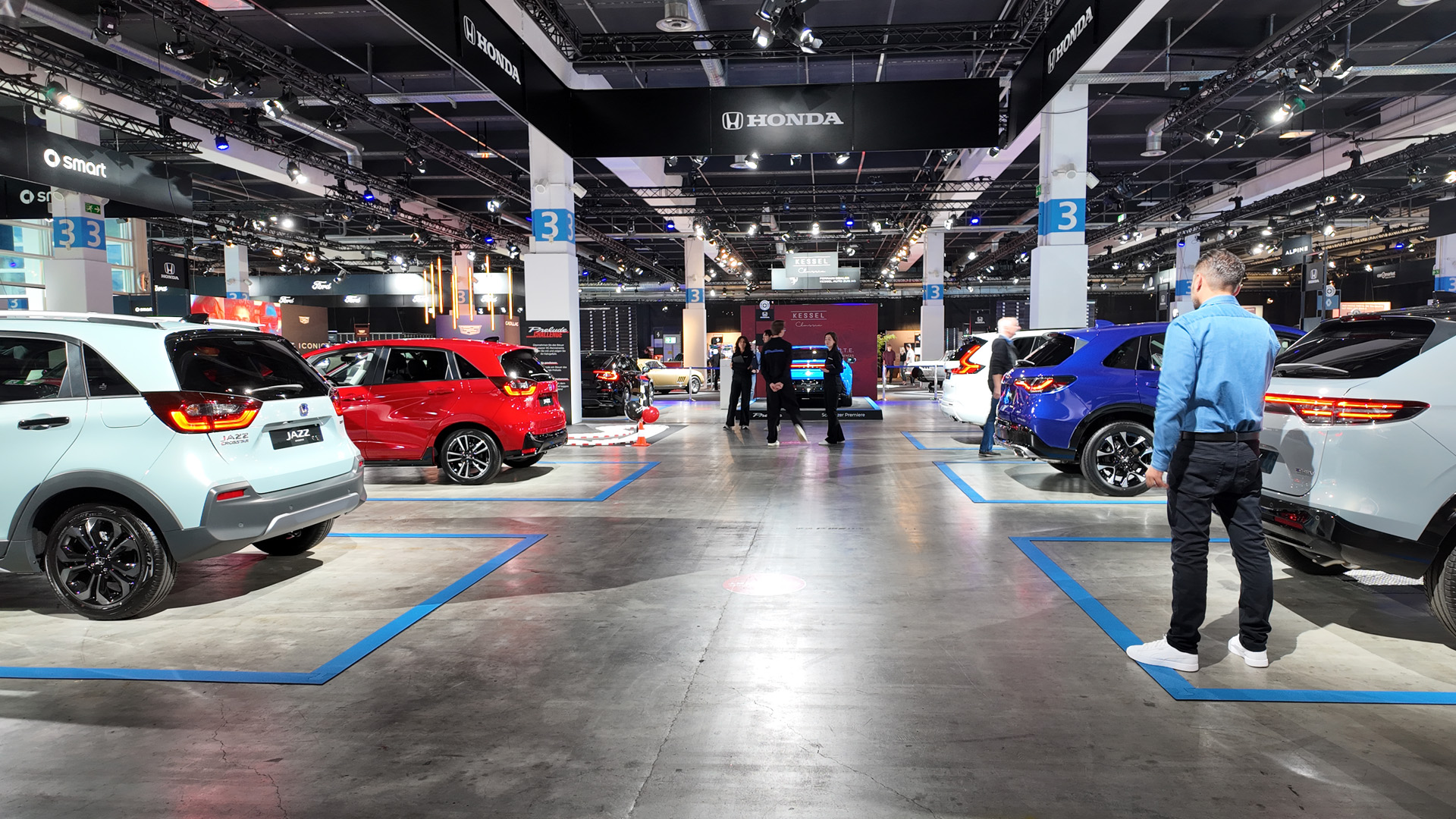 Stand Honda à Auto Zurich 2025 avec vue de dos de la Jazz Crosstar, Jazz, HR-V, ZR-V et CR-V